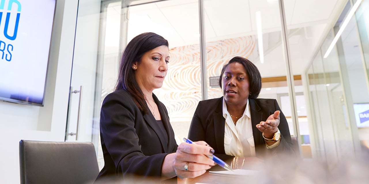 Photo of Jacci McCoy and Tammy Jelinek in SilverPeak Strategic Capital office