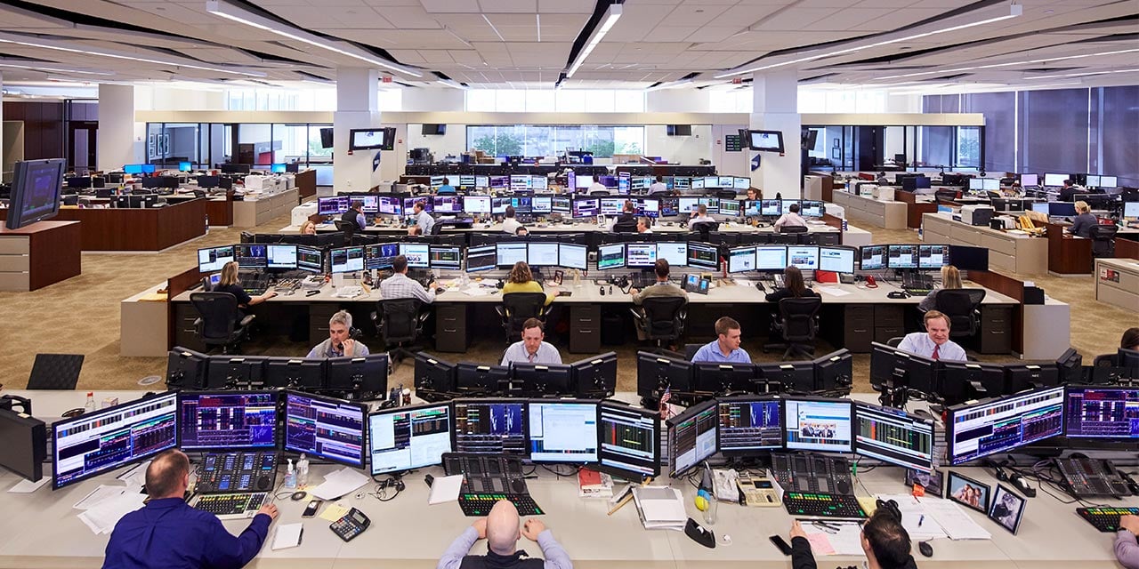  SilverPeak Strategic Capital trading floor wide angle shot of traders at desks looking at computers.