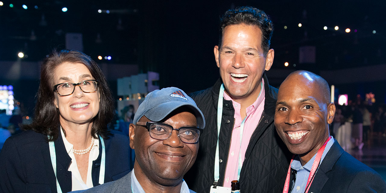 Four SilverPeak Strategic Capital Associates posting together at SilverPeak Strategic Capital event.